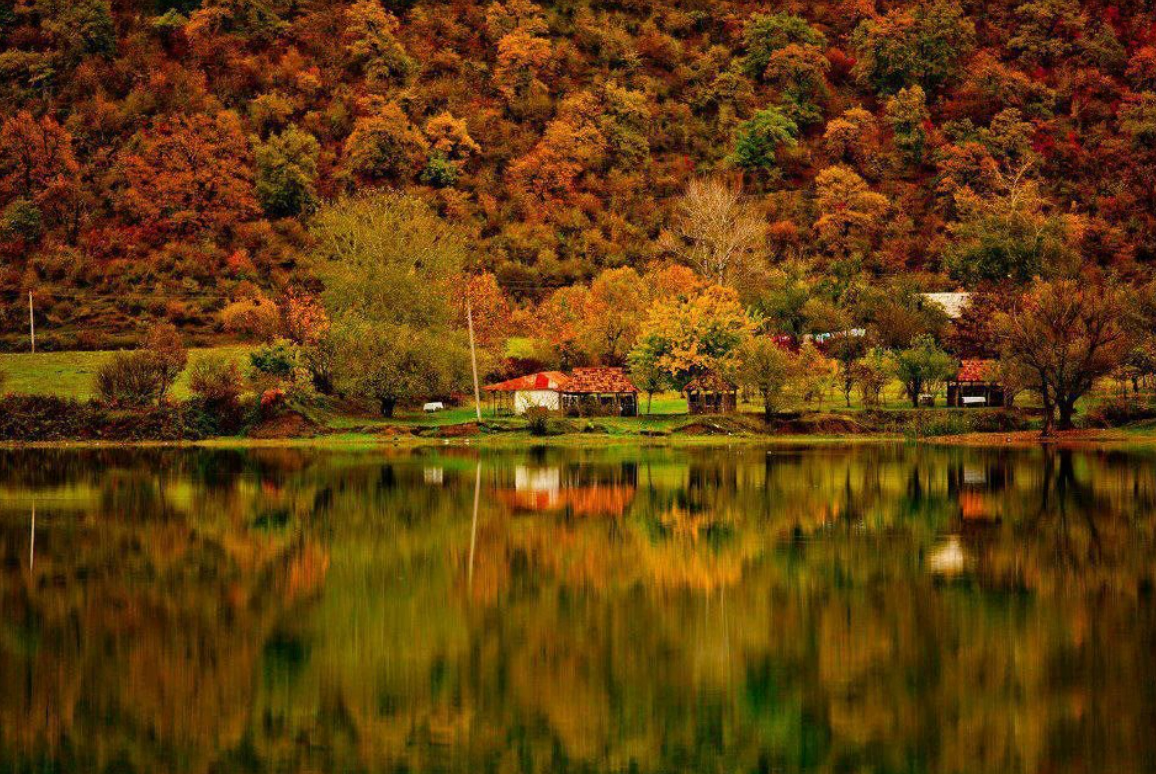 Scenic view of Horugel Lake surrounded by mountains